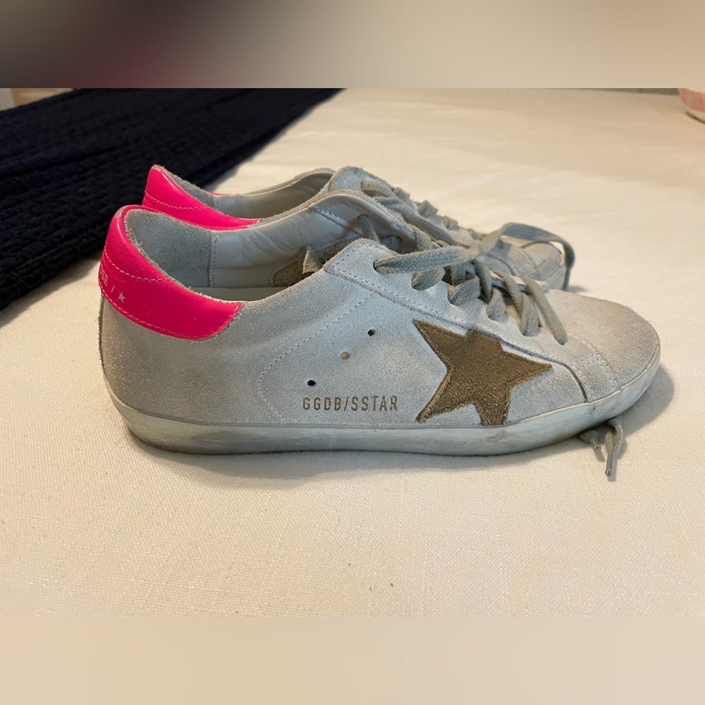 Golden Goose Super Star sneakers with hot pink heel tab and tan suede star